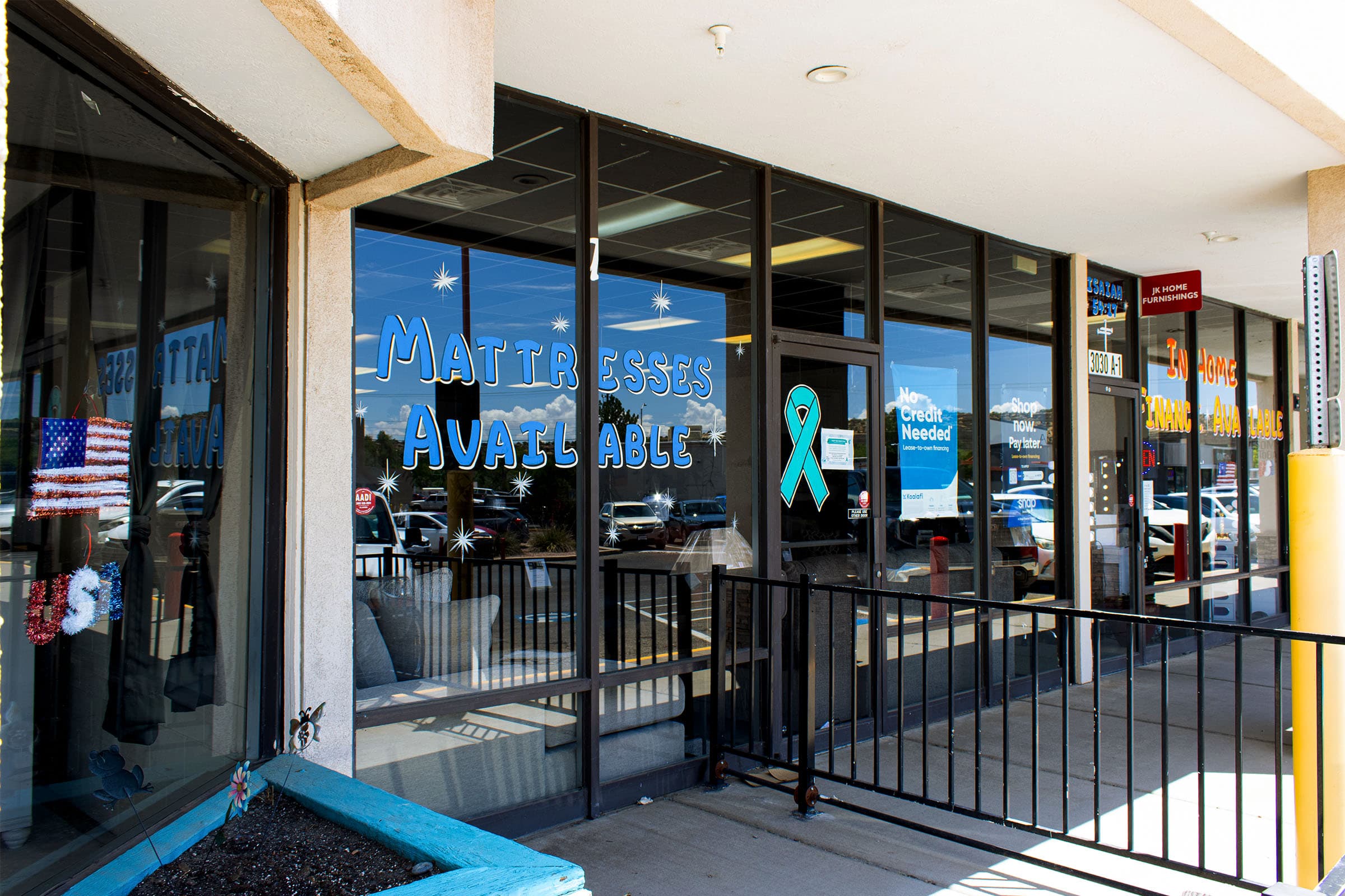 JK Home Furnishings storefront windows in Farmington, NM