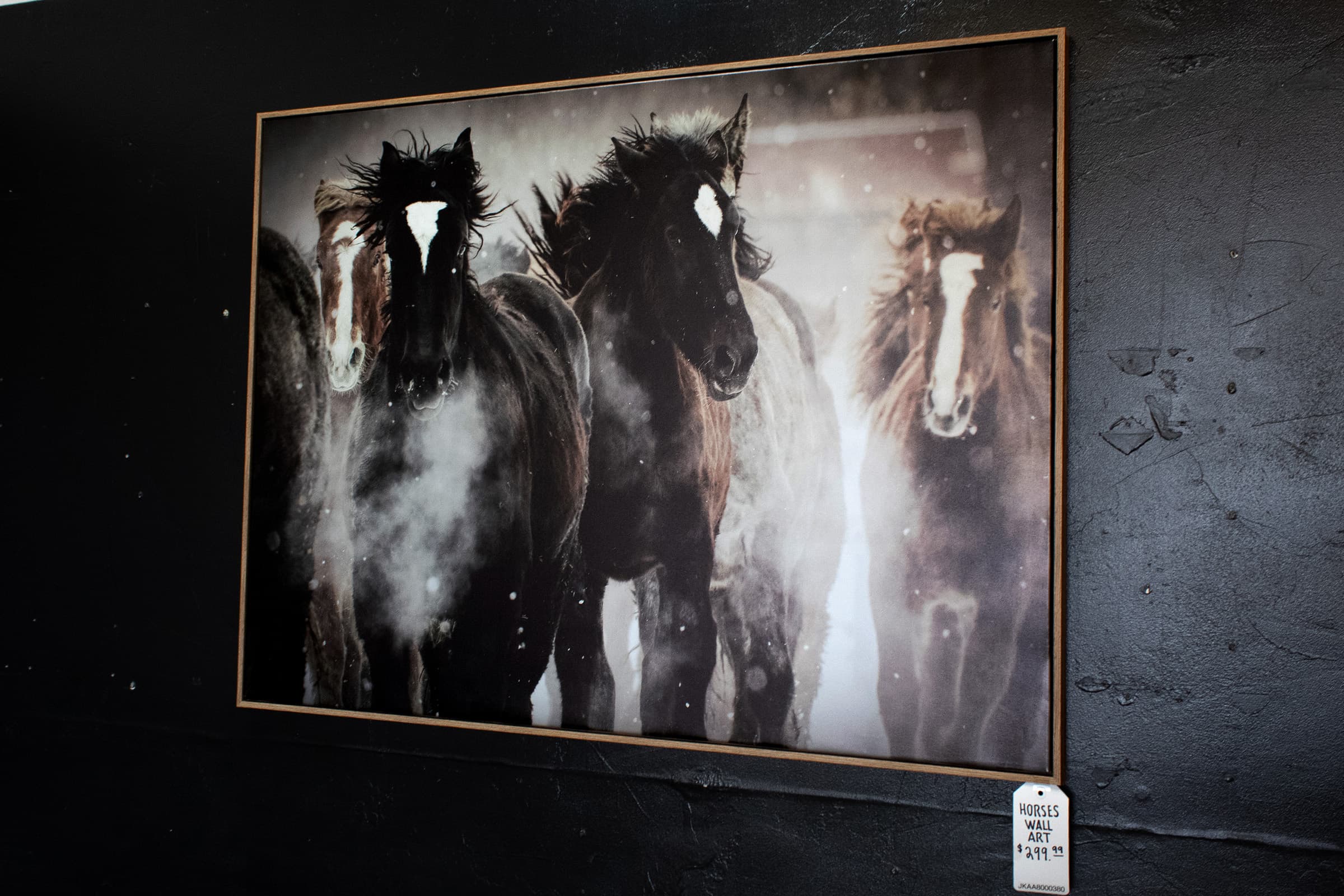 Wall art used in a JK Home Furnishings room setup